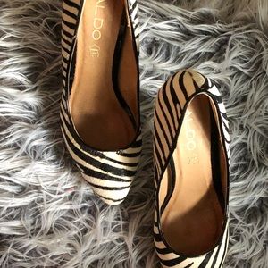 Black and white pony hair pumps. In great condition